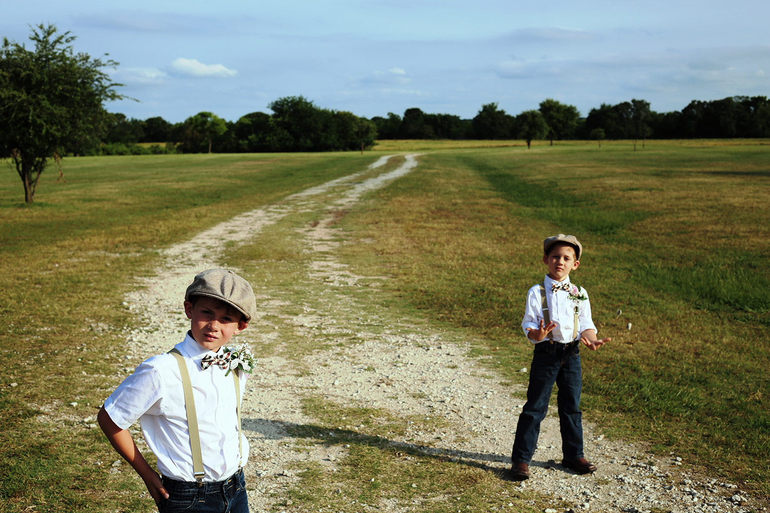 two young boys attending a wedding