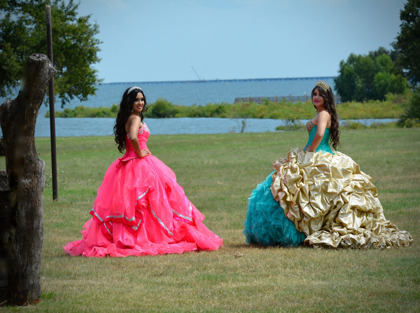 two teenage girls wearing their gowns